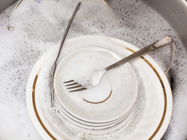 soapy dishes in dishwasher